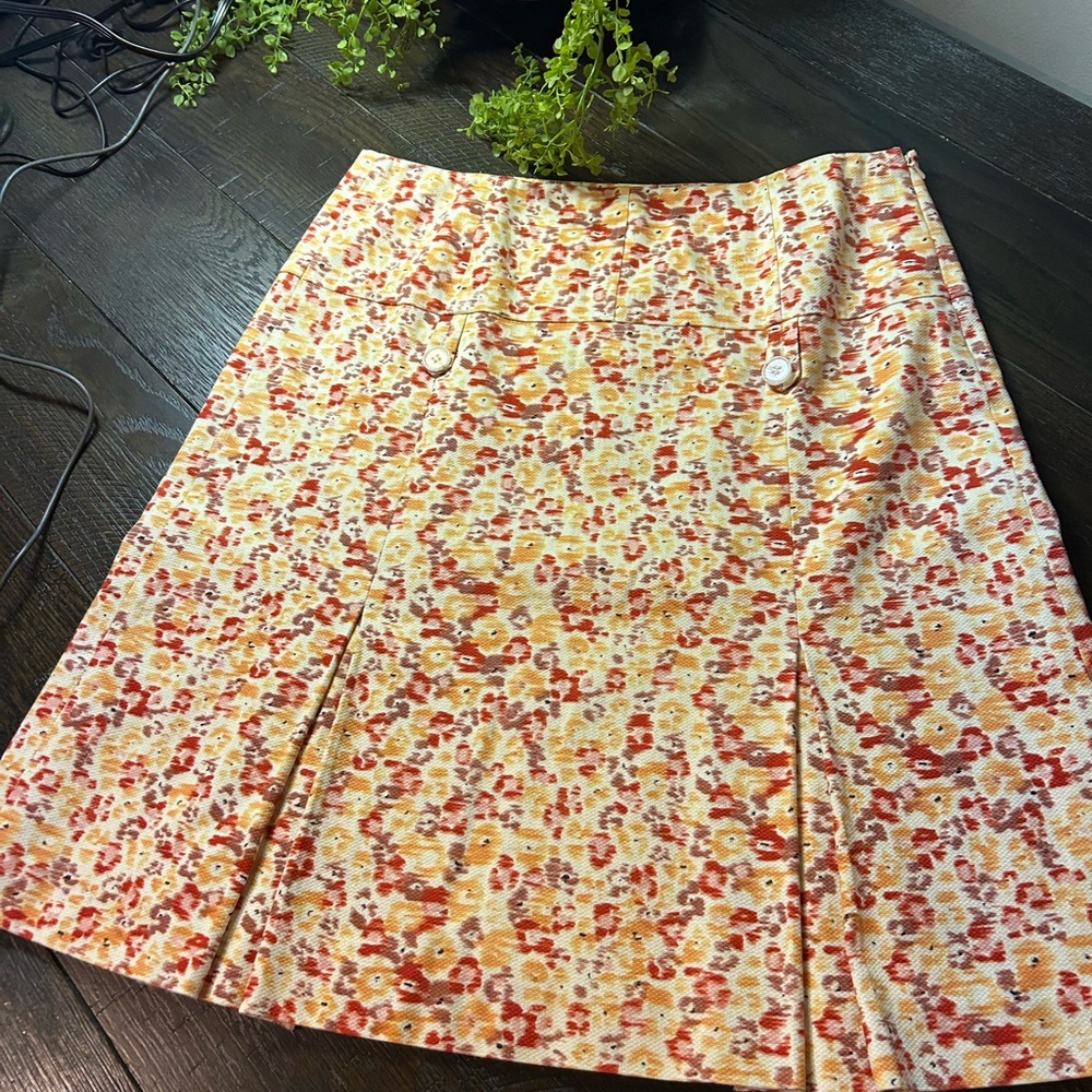 Magaschoni Cream skirt with a beautiful Yellow and Orange Floral Print